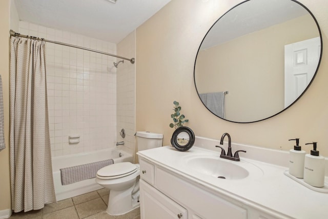 bathroom with vanity, tile patterned floors, shower / bath combo, and toilet