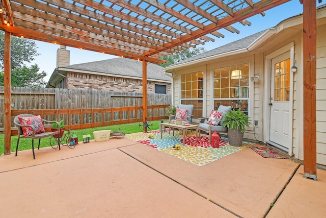 view of patio featuring fence and a pergola