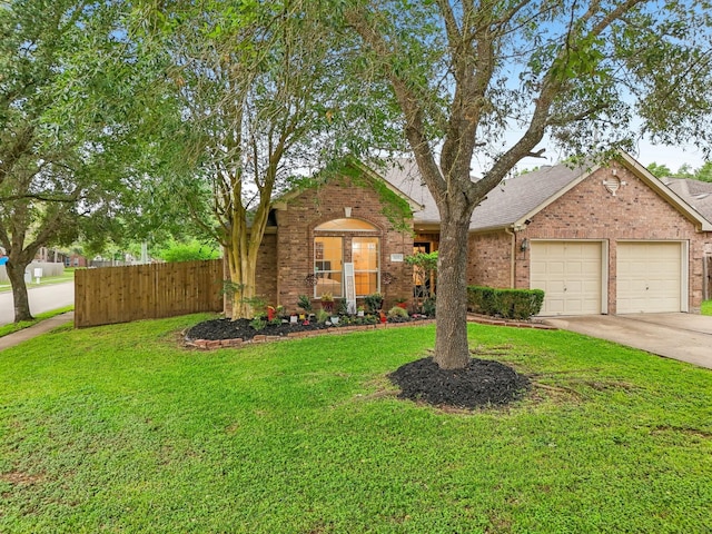 view of front of property featuring driveway, a garage, brick siding, fence, and a front lawn