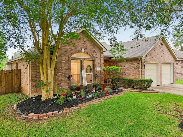 ranch-style home with brick siding, fence, concrete driveway, an attached garage, and a shingled roof