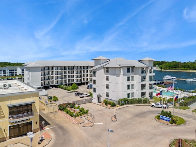view of building exterior with a water view