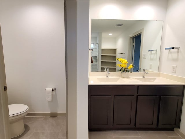 29403 Paytons Park Ct, Katy, TX 77494 - bathroom with tile patterned flooring, toilet, double vanity, and baseboards