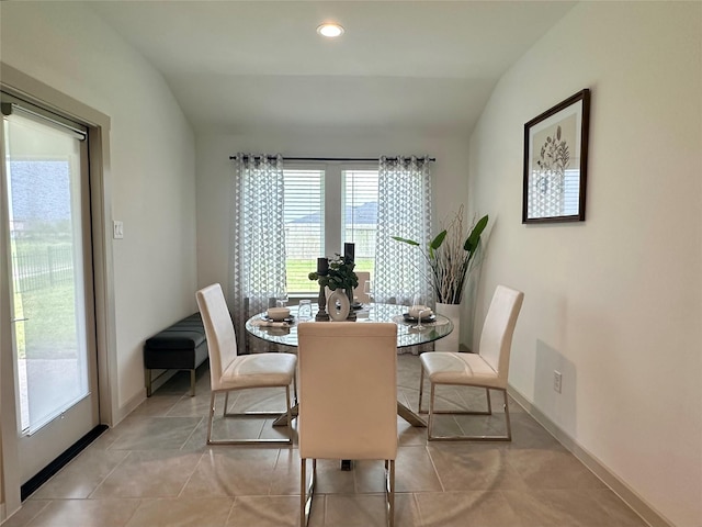 29403 Paytons Park Ct, Katy, TX 77494 - dining room featuring vaulted ceiling, light tile patterned flooring, baseboards, and recessed lighting