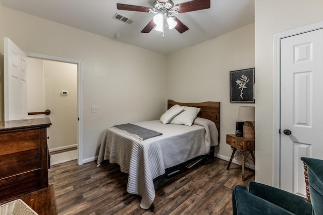 50 Canary St, Point Blank, TX 77364 - bedroom featuring dark wood-style flooring, baseboards, and a ceiling fan