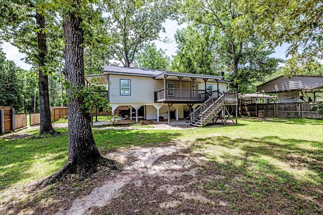 50 Canary St, Point Blank, TX 77364 - rear view of house with stairs and a deck