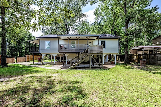 50 Canary St, Point Blank, TX 77364 - rear view of property with stairs
