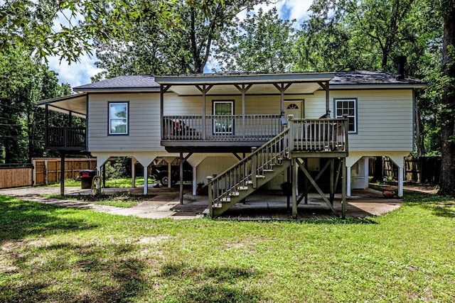 50 Canary St, Point Blank, TX 77364 - back of house with stairway, a carport, and a shingled roof