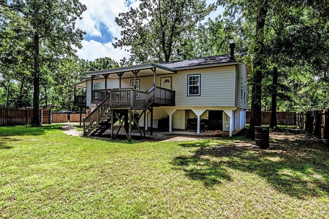 50 Canary St, Point Blank, TX 77364 - back of property with stairs and a wooden deck