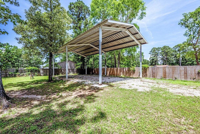 50 Canary St, Point Blank, TX 77364 - view of yard with a detached carport