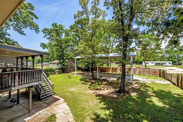 50 Canary St, Point Blank, TX 77364 - view of yard with a wooden deck