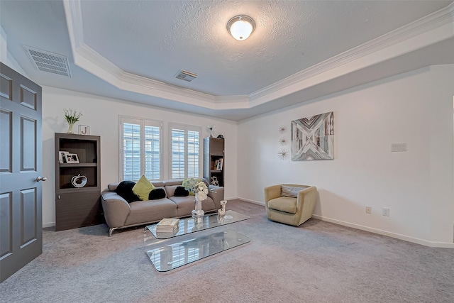 2703 Marble Brook Ln, Pearland, TX 77584 - living area with visible vents, ornamental molding, a raised ceiling, and carpet floors
