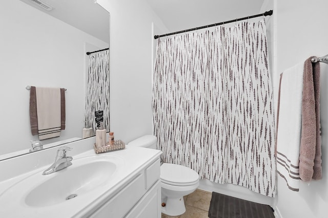 2703 Marble Brook Ln, Pearland, TX 77584 - bathroom featuring toilet, visible vents, tile patterned flooring, and vanity