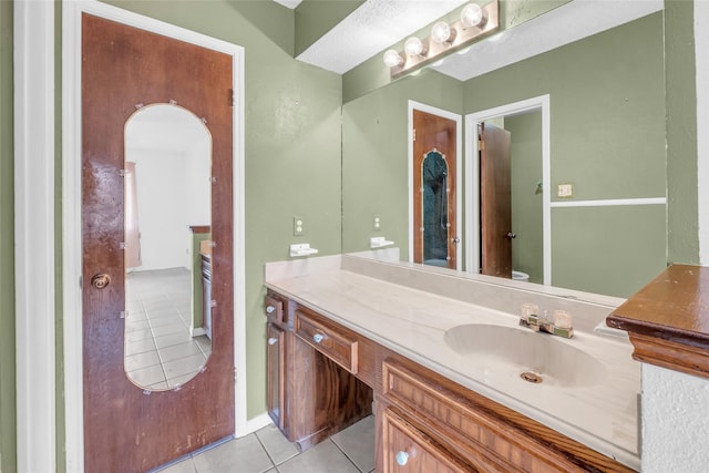 6803 Lakemont Dr, Houston, TX 77050 - bathroom with vanity, tile patterned flooring, and toilet