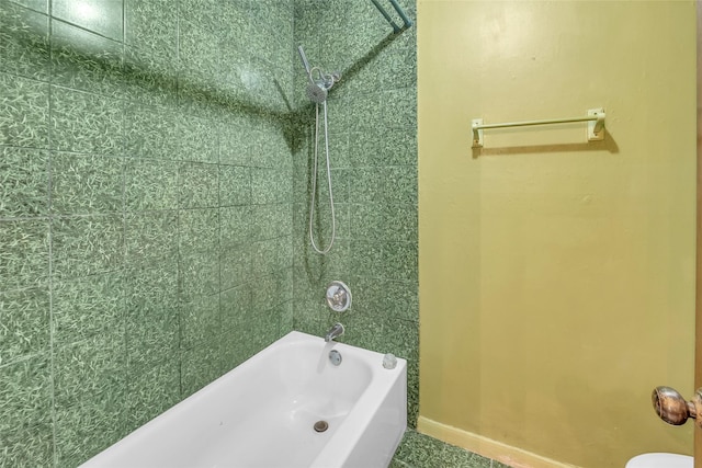 6803 Lakemont Dr, Houston, TX 77050 - bathroom featuring shower / bathtub combination and baseboards