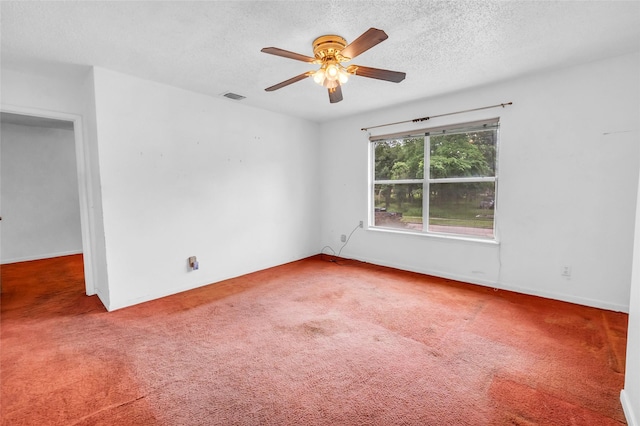 6803 Lakemont Dr, Houston, TX 77050 - unfurnished room featuring visible vents, baseboards, a textured ceiling, a ceiling fan, and carpet