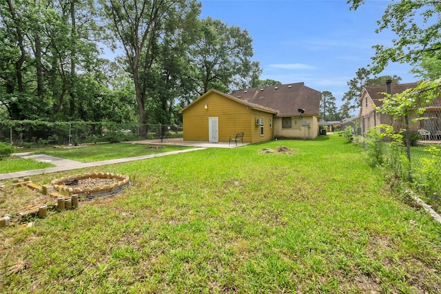 6803 Lakemont Dr, Houston, TX 77050 - view of yard featuring a fenced backyard and a patio area