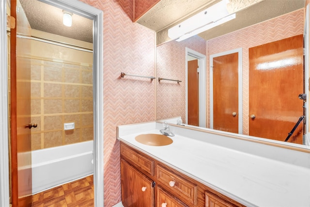 6803 Lakemont Dr, Houston, TX 77050 - bathroom with vanity, tub / shower combination, and wallpapered walls