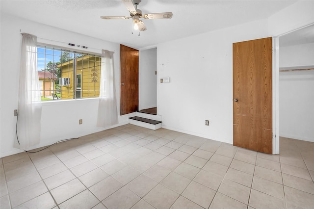 6803 Lakemont Dr, Houston, TX 77050 - interior space featuring light tile patterned floors and ceiling fan
