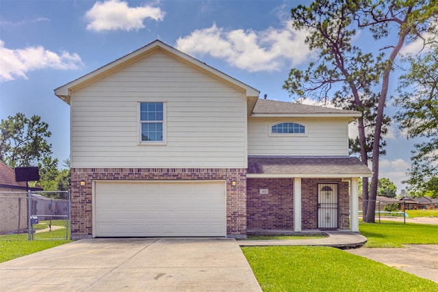 traditional home with brick siding, a garage, driveway, and a shingled roof