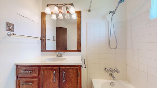 full bathroom with washtub / shower combination and vanity