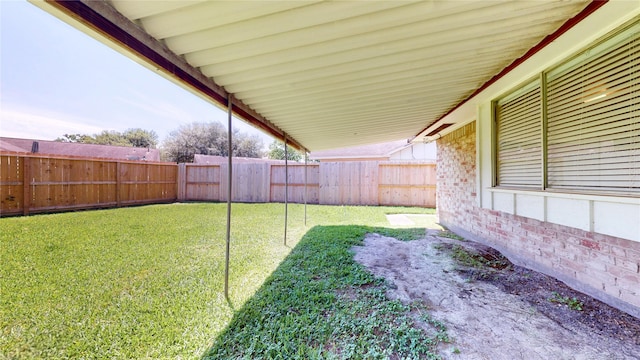 view of yard featuring a fenced backyard