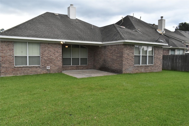 11111 Sprucedale Ct, Houston, TX 77070 - back of house with fence, a patio, a chimney, and brick siding