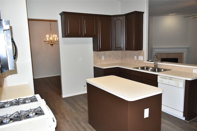 11111 Sprucedale Ct, Houston, TX 77070 - kitchen with a sink, white appliances, dark wood-style floors, and dark brown cabinets