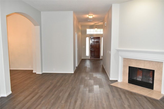 11111 Sprucedale Ct, Houston, TX 77070 - interior space with arched walkways, baseboards, and wood finished floors