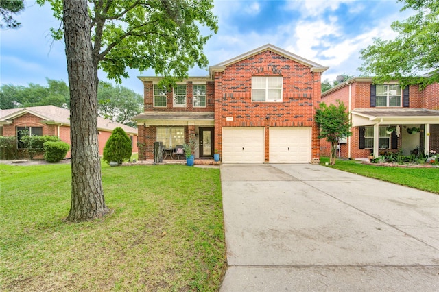 10338 E Summit Canyon Dr, Houston, TX 77095 - traditional-style home featuring an attached garage, a front lawn, brick siding, covered porch, and driveway