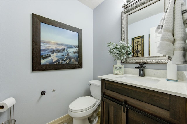 10338 E Summit Canyon Dr, Houston, TX 77095 - bathroom with toilet, baseboards, and vanity