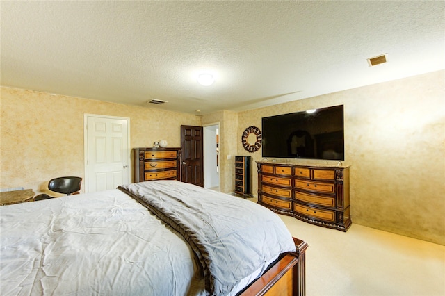 10338 E Summit Canyon Dr, Houston, TX 77095 - bedroom with carpet, a textured ceiling, and visible vents