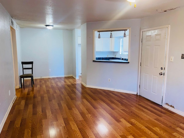12500 Sandpiper Dr Unit 91, Houston, TX 77035 - foyer entrance with baseboards, visible vents, and wood finished floors