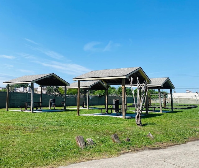 12500 Sandpiper Dr Unit 91, Houston, TX 77035 - view of property's community with a gazebo, fence, and a yard