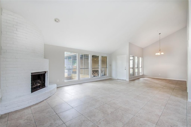 unfurnished living room with a fireplace, baseboards, high vaulted ceiling, a chandelier, and light tile patterned floors