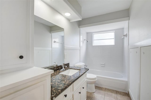 bathroom with toilet, tile patterned floors, shower / tub combination, and vanity