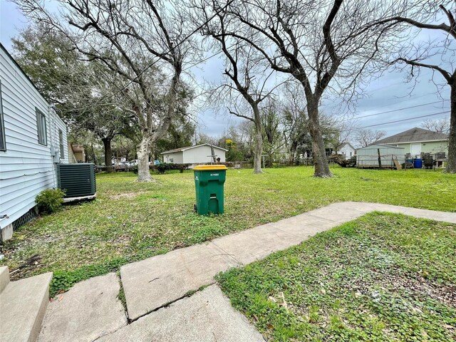 1827 Neuman St, La Marque, TX 77568 - view of yard with central AC unit