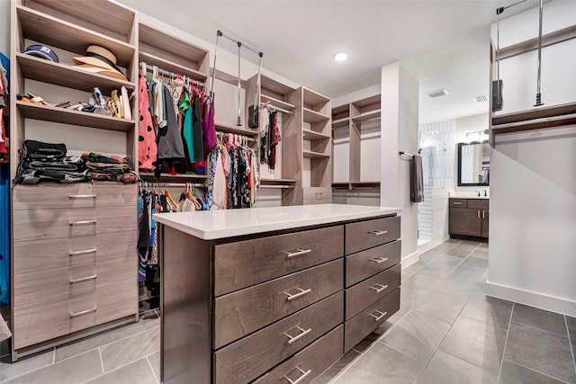 spacious closet with tile patterned flooring and visible vents