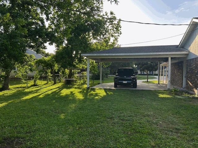 view of yard featuring a carport