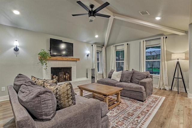 living room with ceiling fan, a fireplace, baseboards, wood finished floors, and recessed lighting