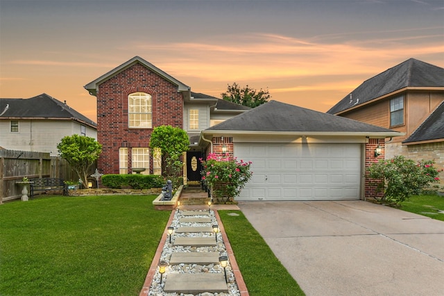 traditional home with brick siding, concrete driveway, and an attached garage