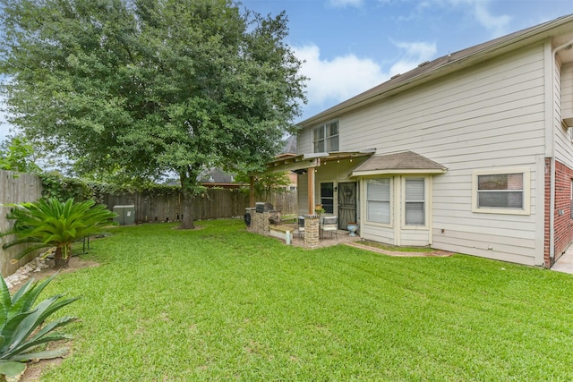 rear view of property with a patio