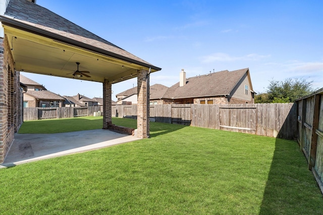 31183 Pecan Creek Dr, Brookshire, TX 77423 - view of yard with a fenced backyard, ceiling fan, a patio area, and a residential view