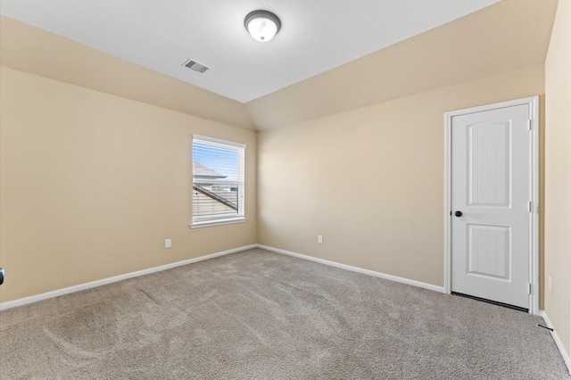 31183 Pecan Creek Dr, Brookshire, TX 77423 - spare room featuring carpet flooring, baseboards, visible vents, and lofted ceiling