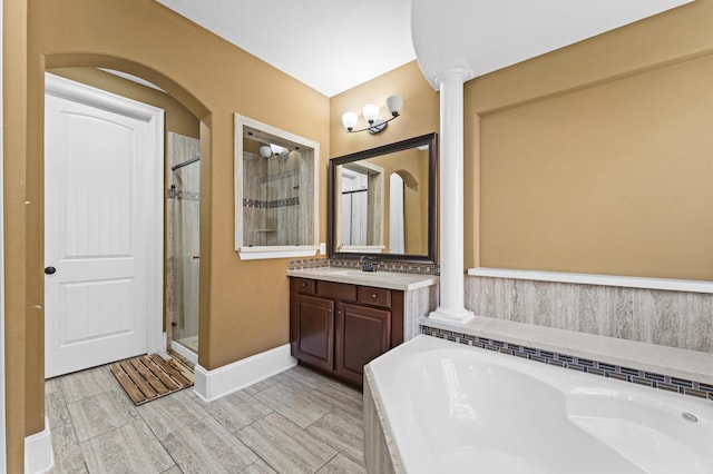 31183 Pecan Creek Dr, Brookshire, TX 77423 - bathroom featuring a garden tub, baseboards, vanity, and a shower stall