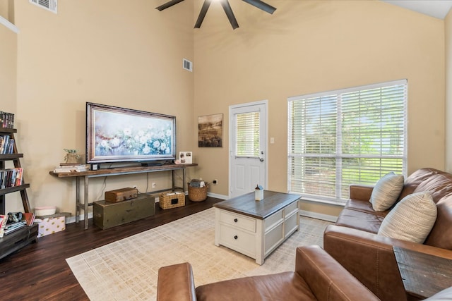 14854 Altair Ct, Willis, TX 77318 - living room featuring a ceiling fan, visible vents, and light wood finished floors