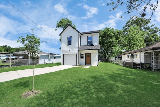 view of front of house with a garage, fence, driveway, and a front yard