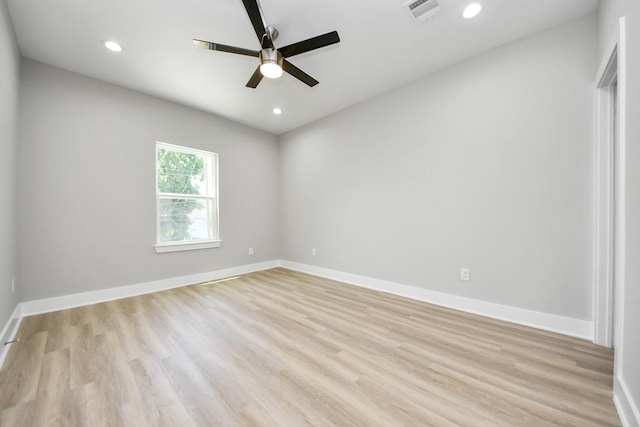 unfurnished room featuring visible vents, light wood-style floors, baseboards, recessed lighting, and a ceiling fan