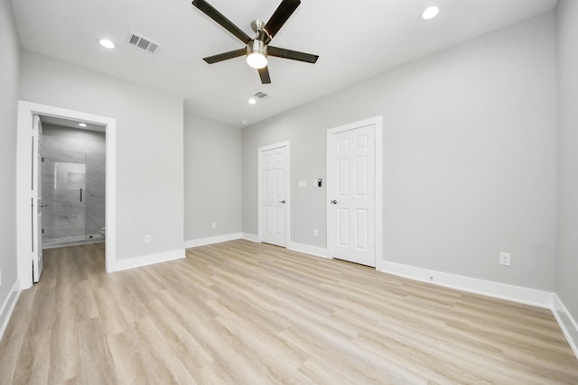 unfurnished bedroom with visible vents, two closets, baseboards, recessed lighting, and light wood-type flooring