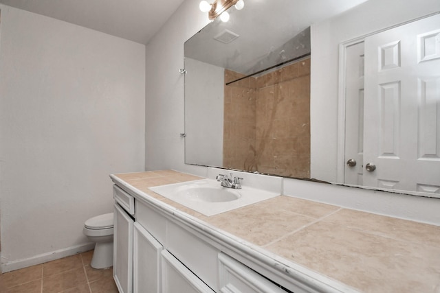 full bathroom featuring a shower, tile patterned floors, baseboards, vanity, and toilet