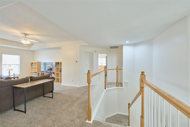19106 S Rim Trl, Spring, TX 77388 - carpeted living room featuring baseboards, a ceiling fan, and visible vents
